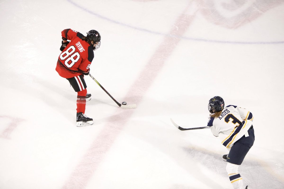 Skylar Irving handles the puck in a game against Merrimack March 2. Irving led the team in points this season with 35. 