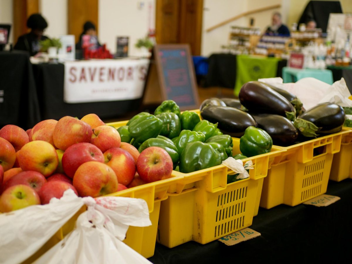 Fresh apples, bell peppers and eggplants overflow from yellow baskets. Sourced locally, organizers prided themselves on enhancing access to the healthy options. 
