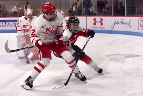 Dylan Hryckowian plays hard on the ice against BU. The Huskies skated to a 17-16-3 record on the 2023-24 season.