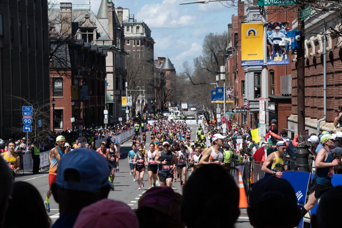 Hundreds of runners race toward the finish line on Boylston Street. Almost 30,000 athletes participated in this year’s marathon.