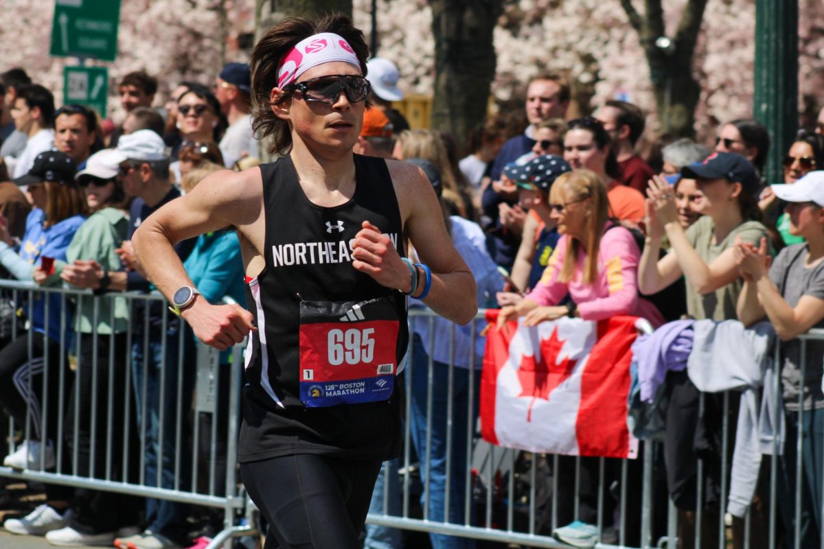 John Jantz, a Northeastern alum from the class of 2015, runs in the Boston Marathon. The marathon began in Hopkinton and ended on Boylston Street.

