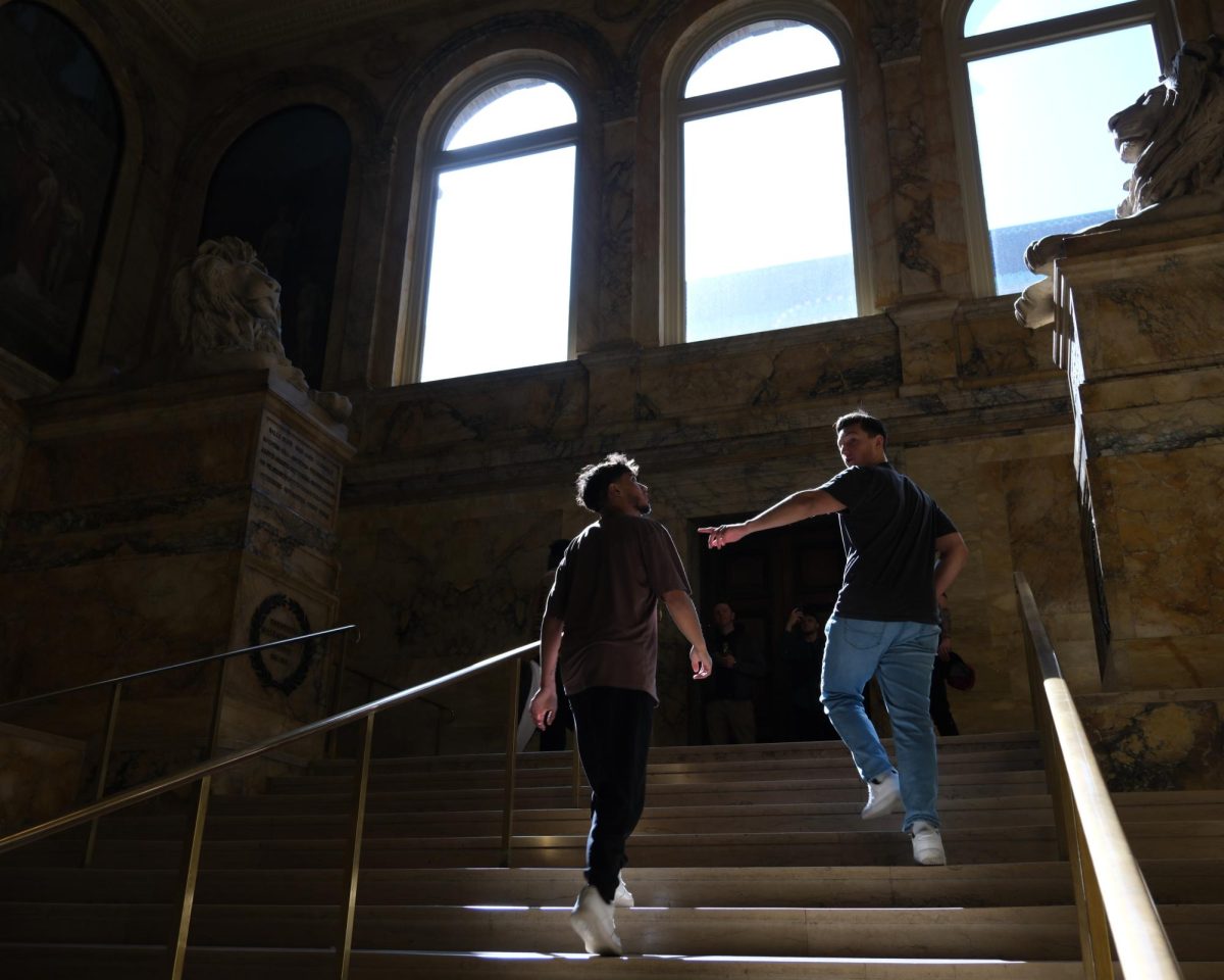 Two+visitors+climb+the+Grand+Staircase+at+the+Boston+Public+Library%E2%80%99s+McKim+Building+in+awe.+Over+2+million+people+visited+the+Boston+Public+Library%E2%80%99s+25+locations+in+2023.