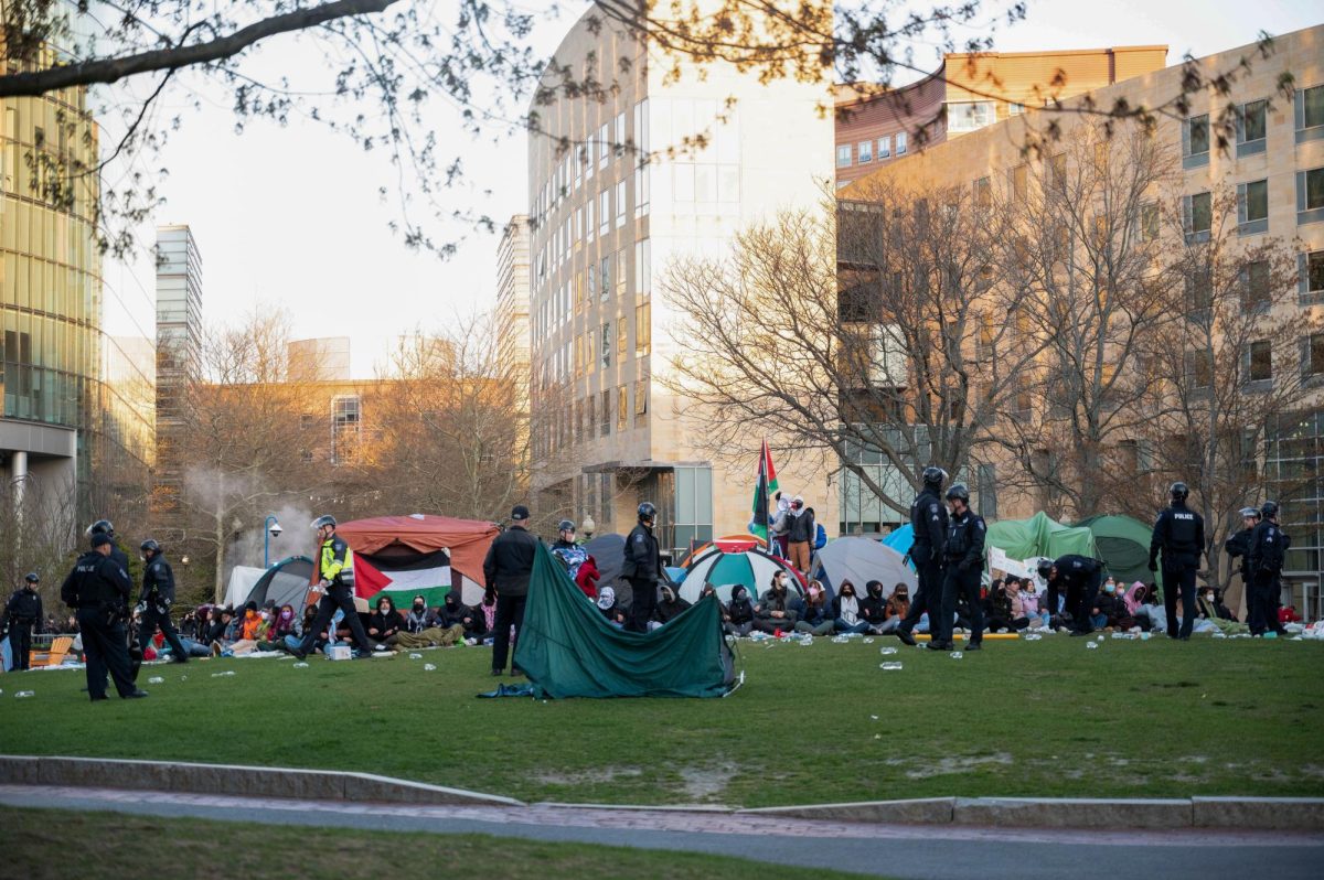 Police+officers+dismantle+the+pro-Palestine+encampment+on+Centennial+Common+April+27.+A+coalition+of+over+100+Northeastern+student+organizations+signed+on+to+a+statement+addressed+to+campus+administration+condemning+the+university%E2%80%99s+response+to+the+encampment.