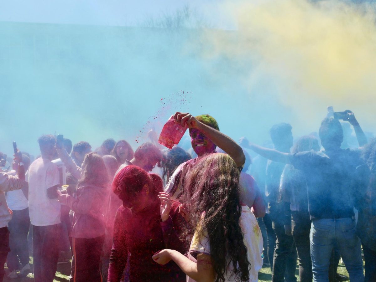 VIDEO: Thousands throw color on Centennial at Northeastern’s annual Holi celebration