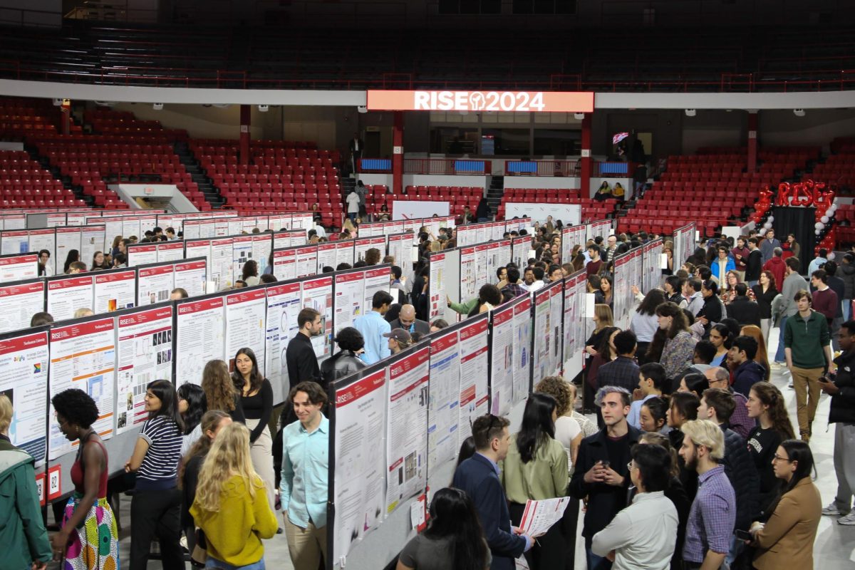 Students+present+research+and+creative+projects+to+members+of+the+Northeastern+community+at+the+RISE+Expo+in+Matthews+Arena+April+11.+Over+400+undergraduate+and+graduate+students+attended+the+event.