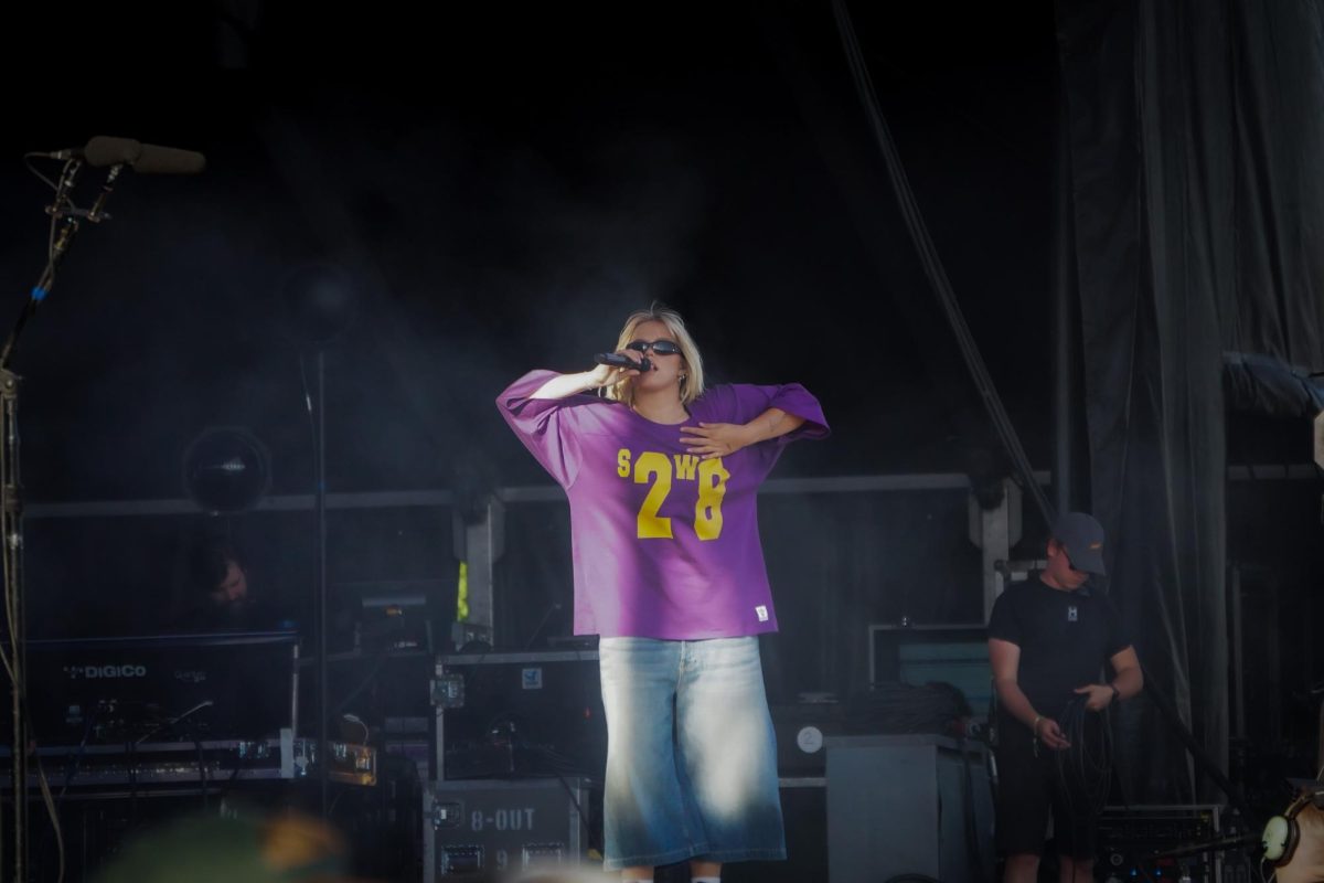 Rapp looks out over the audience while performing on the Green Stage. Rapp started touring for her “Snow Hard Feelings” tour in September 2023. 