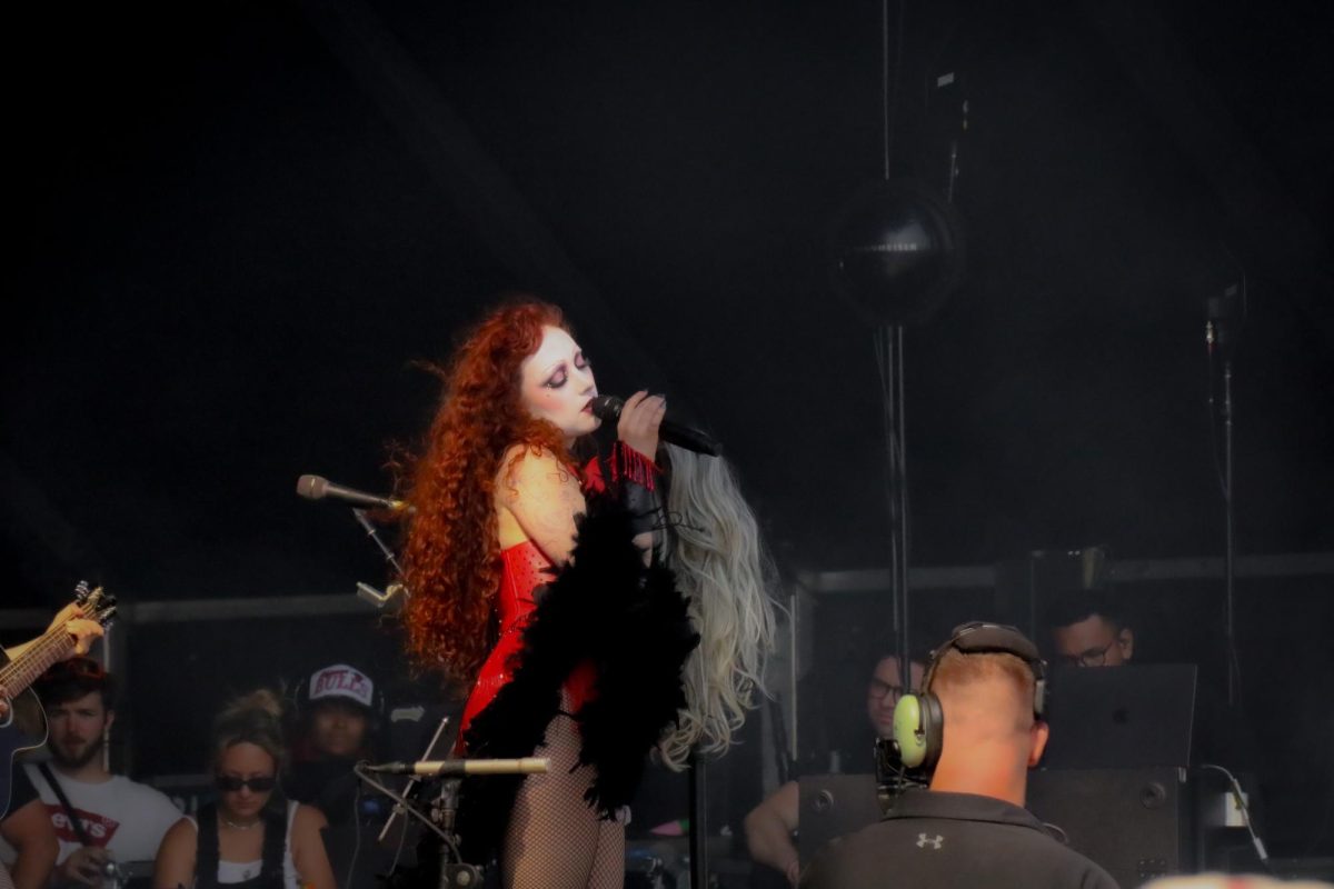 Roan performs with a blonde wig on her microphone stand during her song “Picture You.” Roan has brought out the same wig to perform with in many of her past concerts on tour.