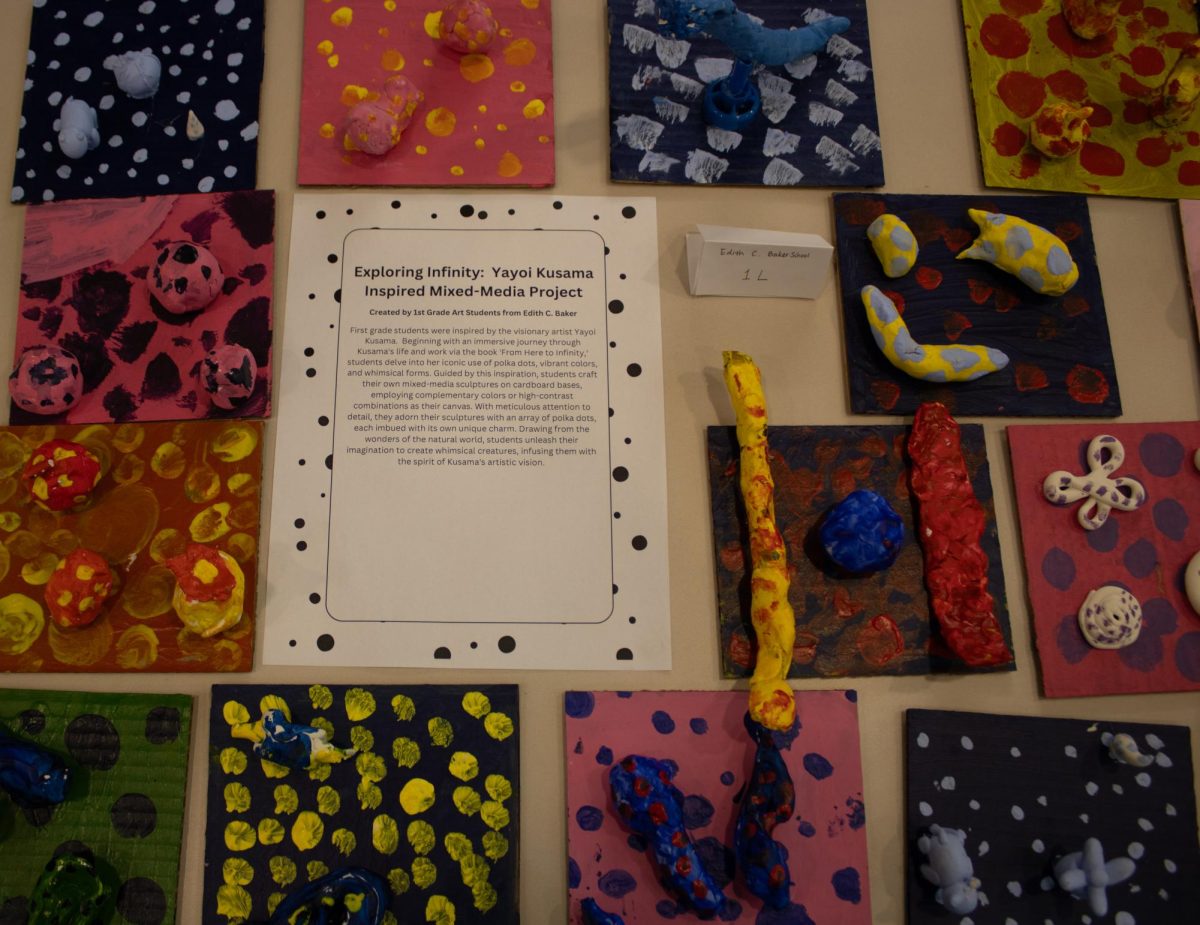 Students from the Baker School present their art collection, “Exploring Infinity.” After reading “From Here to Infinity,” students were inspired by Japanese artist Yayoi Kusama.