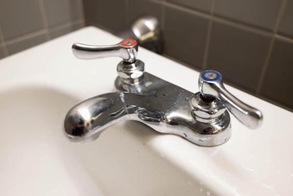 A sink faucet in a Shillman Hall restroom. The faucet was one of three in the restroom.
