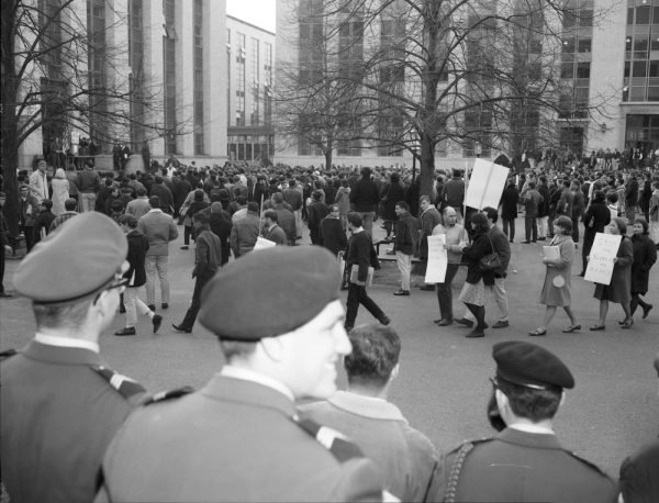 Students walk in what is now Krentzman Quad in 1965 with signs protesting the Vietnam War. By 1968, the nationwide Vietnam War resistance movement had reached Northeastern. Photo courtesy Northeastern University Archives and Special Collections.