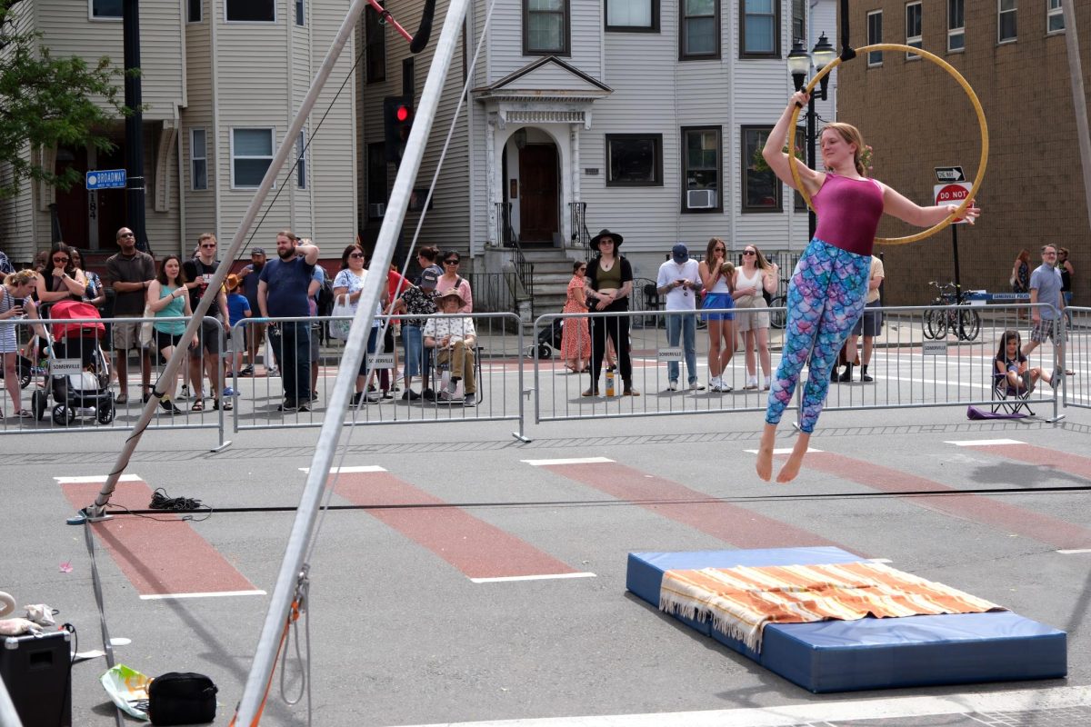 A gymnast performs stunts for a crowd during the SomerStreets Carnaval June 2. Read more here.