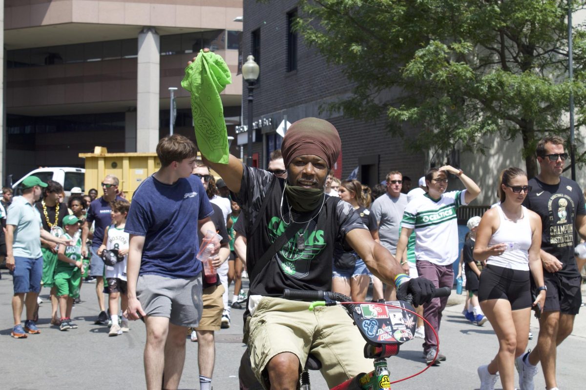Longtime Celtics supporter Marlon Trotman pops a wheelie and zips between the crowd as he celebrates the victory. For diehard fans like Trotman, the day was everything they dreamed of and more. “They did it, man, its a togetherness, it aint no one person, no two person — everybody did it,” Trotman said. “Boston’s a great city to be in, especially in the sunshine.”