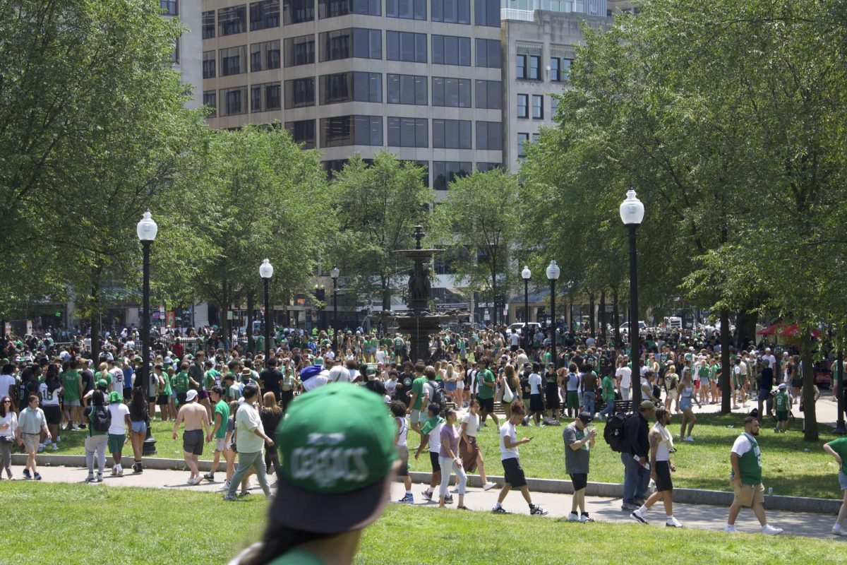 A sea of green and white disperses as fans fill their favorite bars to continue the festivities. Lucky fans encountered partying Celtics players and their trophies as they joined in.