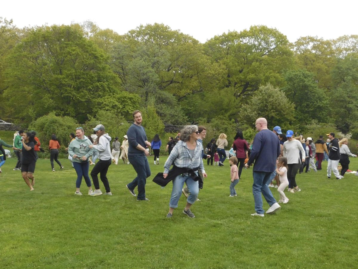 Families at the Arboretum dance to Afrobeat music. The Arboretum hosted an Afro-fusion dance lesson taught by BalletRox.