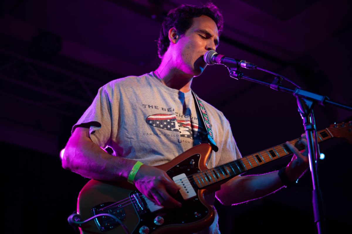 Connor O’Reilly, vocalist and guitarist of Off Wing, sings into the microphone. The band’s self-titled album was released in July 2023.