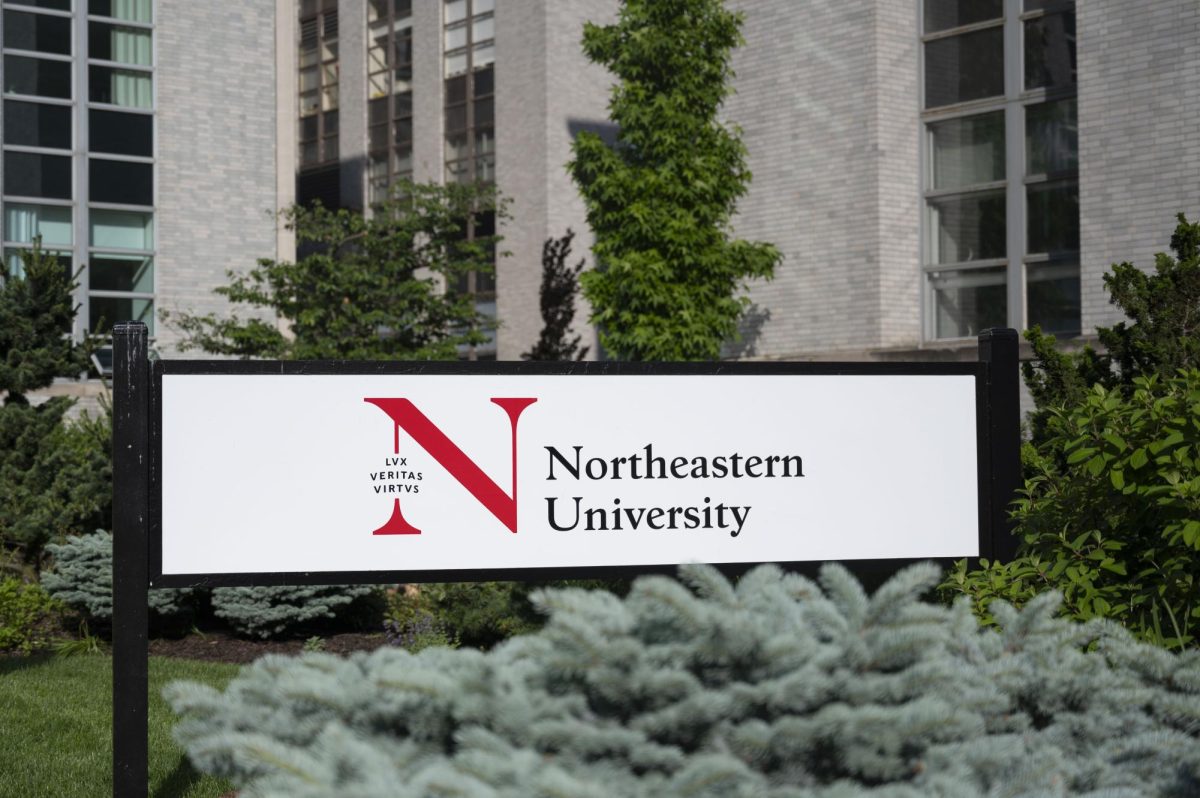 A Northeastern University sign on the Boston campus. Northeastern's acceptance rate dropped to 5.2% for the Class of 2028 fall 2024 admissions cycle, but students doubt the number is representative of the university's selectivity and quality. 