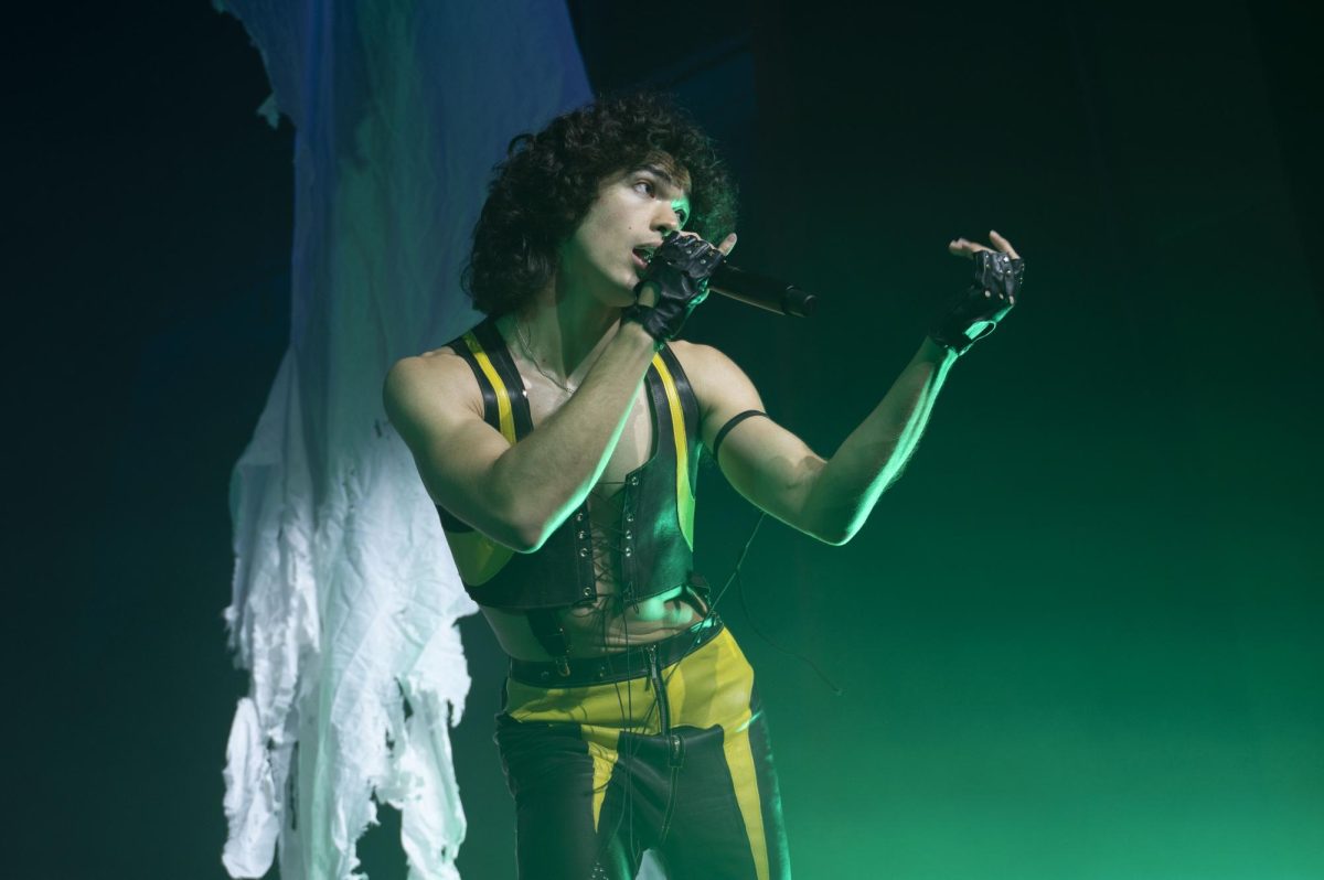 Conan Gray gestures toward the audience as he sings one of his opening songs. Gray performed night two of his "Found Heaven On Tour" Boston shows Sept. 26 to a sold-out audience.