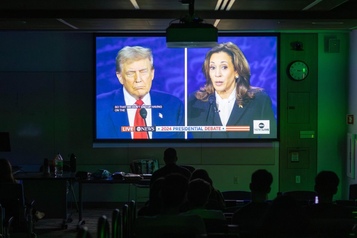 NUCR students partake in viewing the ABC presidential debate candidates Donald Trump and Kamala Harris in Richards Hall room 300. Throughout the viewing, students chuckled at the candidates' statements and quipped among themselves. 