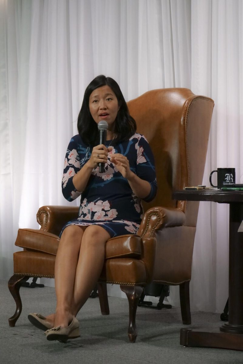 Michelle Wu speaks during a discussion with Katie Johnston at the Globe Summit 2024. Wu spoke about her efforts and goals in changing hiring approaches in Boston.