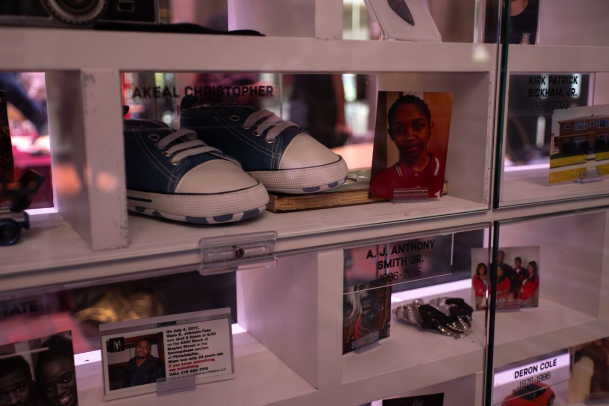 Personal objects and photos inside of the bricks in the memorial. The personal possessions, photos and other items inside were donated by loved ones of someone who died because of gun violence.