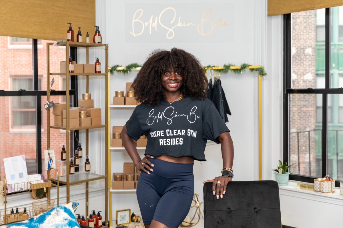 Akou Diabakhate poses for a photo in an old Bold Skin Babe salon location on Newbury Street. Bold Skin Babe was founded in 2020 and specializes in the care of melanated skin. Photo courtesy John Wilcox, Bold Skin Babe.