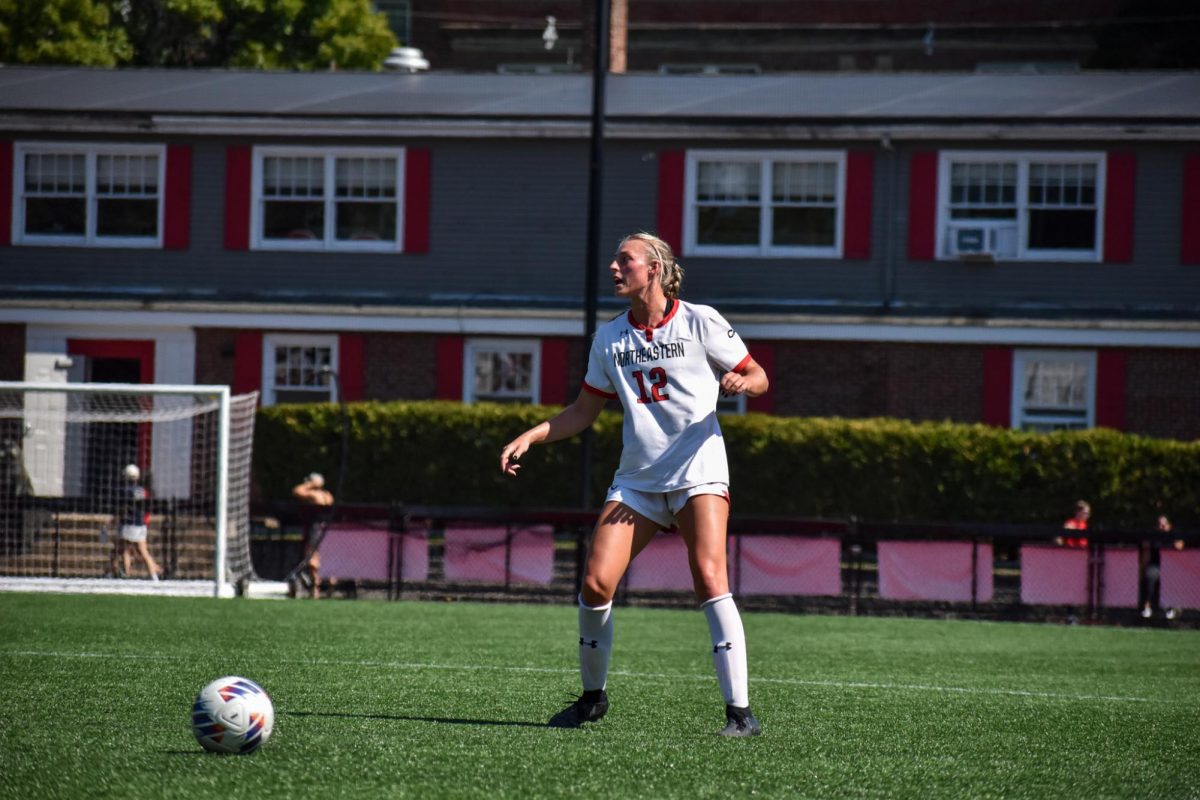 Graduate defender Addison Davis prepares to take a kick in a scoreless draw against Bryant Sept. 15. Northeastern tallied just two shots compared to Brown’s 25 Sept. 19.