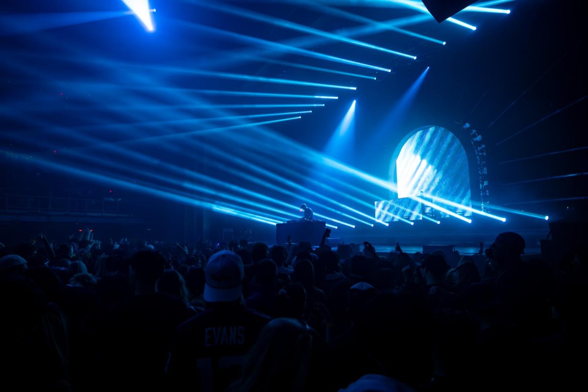 Mesto plays as the floor fills and blue lasers shine over him. He was the last opener before Zedd came on.