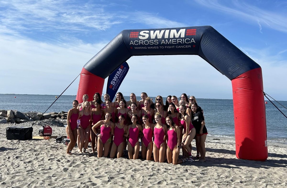 Northeastern’s swim and dive team comes together at the Swim Across America event in Narragansett, Rhode Island Sept. 7. The Huskies raised $19,000, a personal team best. Photo courtesy Katie Rivers.