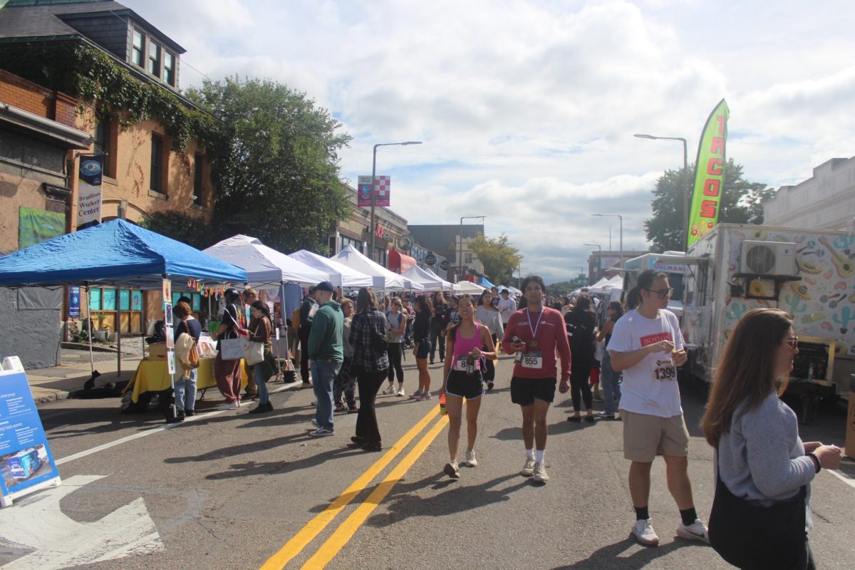 Attendees line up for booths and food trucks close to the front of the festival. There were many food options, including Roxy’s Grilled Cheese and Tandoor and Curry on Wheels.