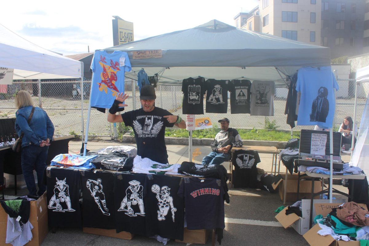 Tree poses with his provocative silk-screened T-shirts. He said he hoped his work would be an inspiration to others to create and enjoy art as a force of nature.