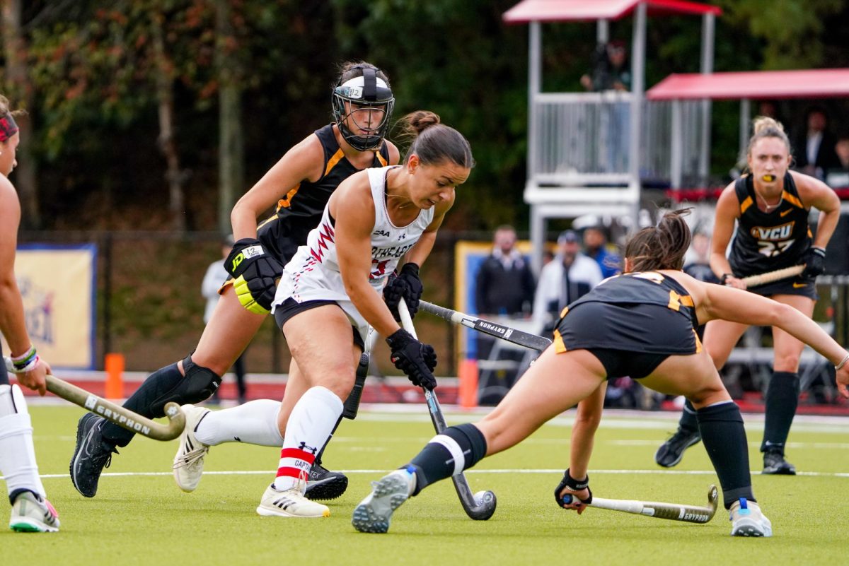 Captain Lauren Rowe maintains possession of the ball Sept. 22. She notched three goals against UMass Lowell Sept. 29, getting named CAA Player of the Week.