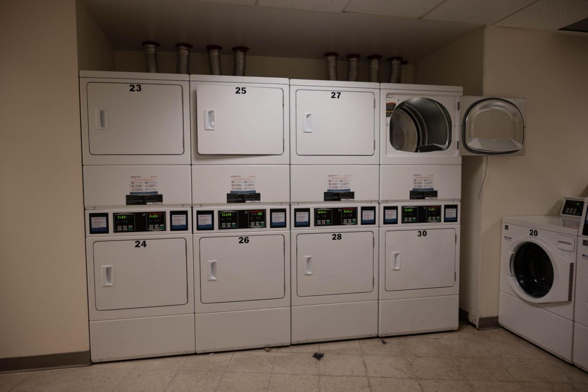 Drying machines in the West Village A North laundry room. Students moving in this fall were pleasantly surprised to see free laundry machines in residence halls.