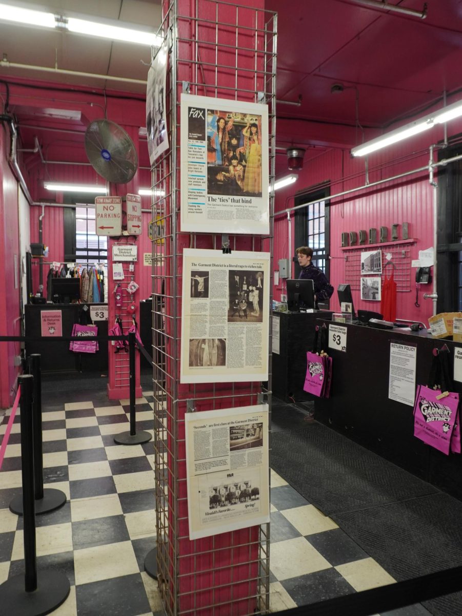 Old newspaper pages hang on display near the checkout counter. Old articles were plastered all over the store, showing its deep-rooted history.