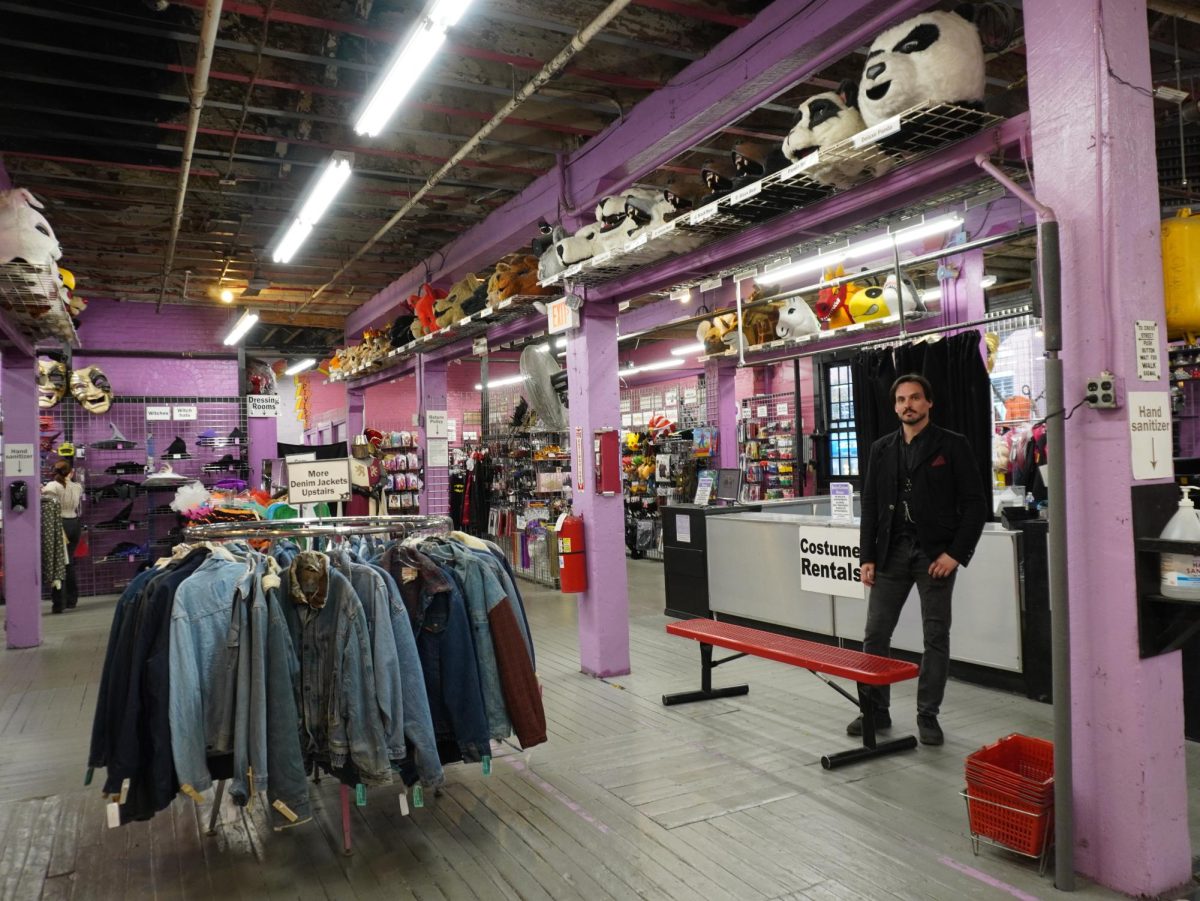 Eric Propp stands in front of the costume rentals part of the store. Boston Costume joined The District in 2007.