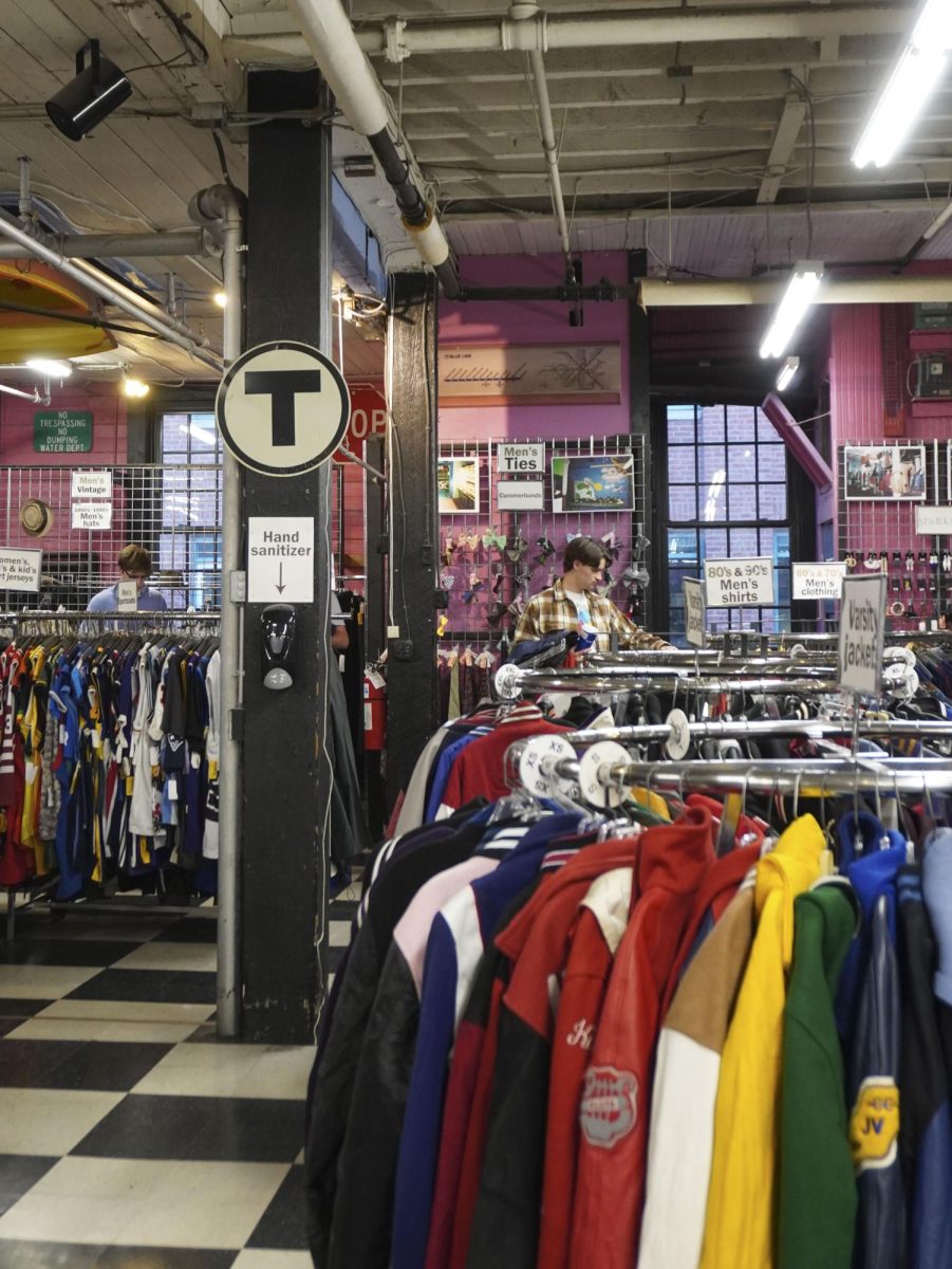 Customers search through the men’s section of the store. The section included numerous options like vintage jackets and shirts.