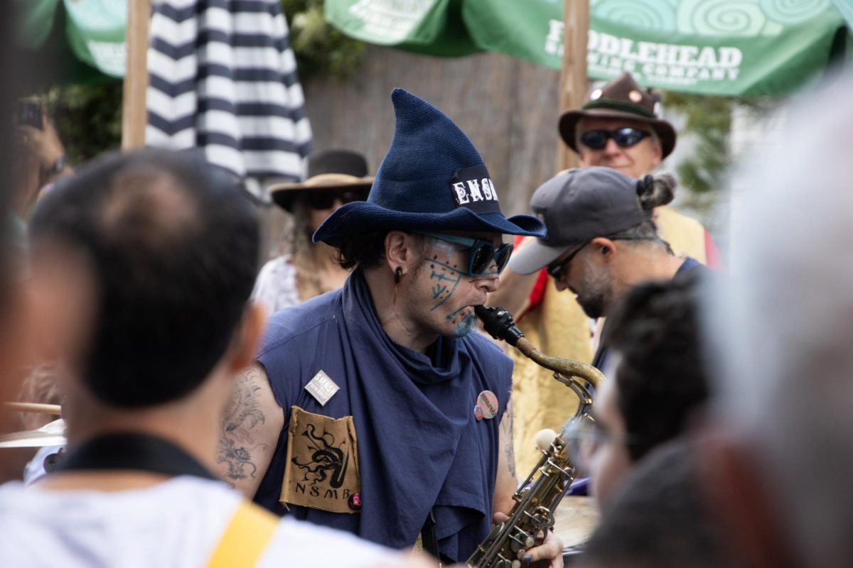 A saxophonist from Emperor Norton's Stationary Marching Band plays a solo. Coordinated band outfits were a common sight at the festival.