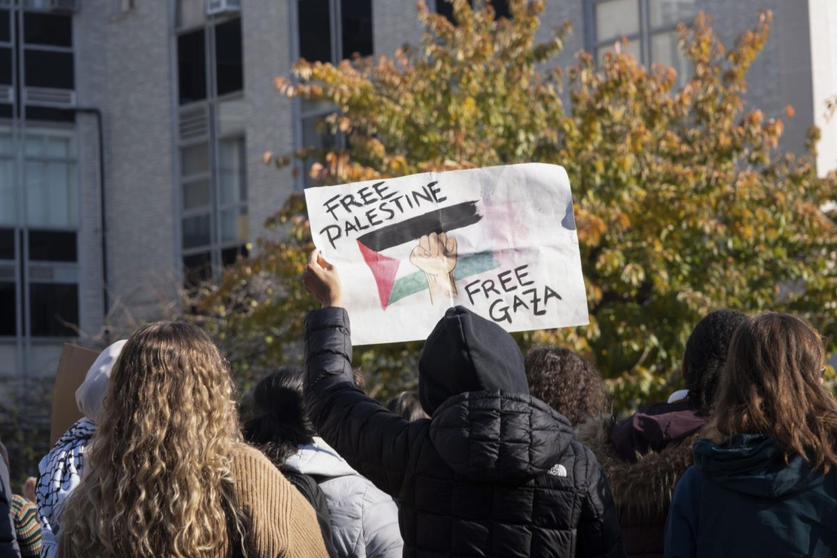 A protester holds up a sign at a rally hosted by Northeastern University School of Law Students for Justice in Palestine Nov. 16, 2023, that called for an Israeli ceasefire. Protests calling for a ceasefire were held on college campuses across the country in the past year.