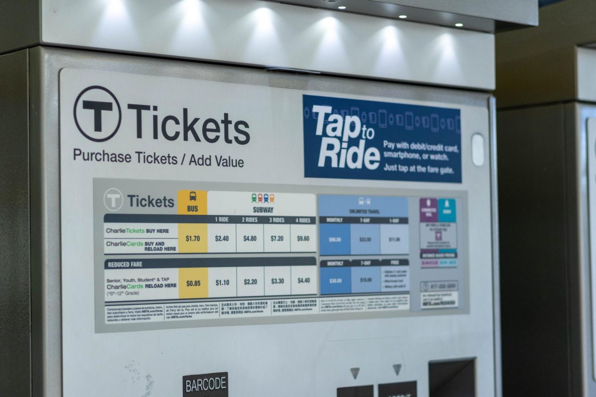 A MBTA fare machine at Ruggles station. Above the interactive screen, the ticket price infographic showed the price for bus and subway rides.