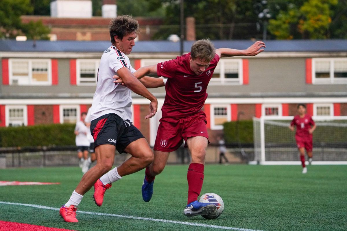 Tomas Sciarra fights for possession against Harvard Sept. 17. The Husky secured a shot on goal for the last three straight games.