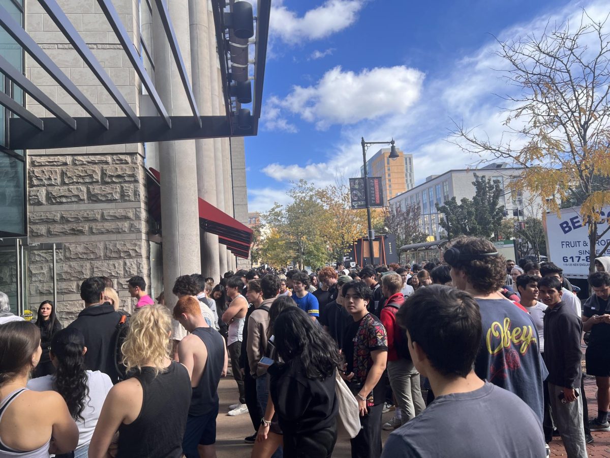 Students who were evacuated from Marino stand outside. An NUPD officer said the fire alarm in the building was triggered by a malfunctioning suppression pipe.