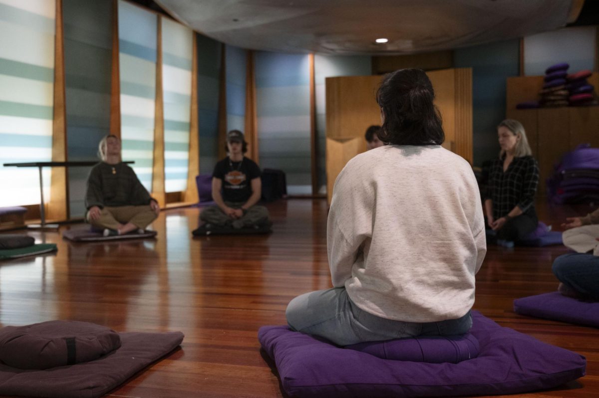 Students meditate in Northeastern’s Center for Spirituality, Dialogue, & Service's Sacred Space. The class was part of a daily guided meditation hosted by the center.