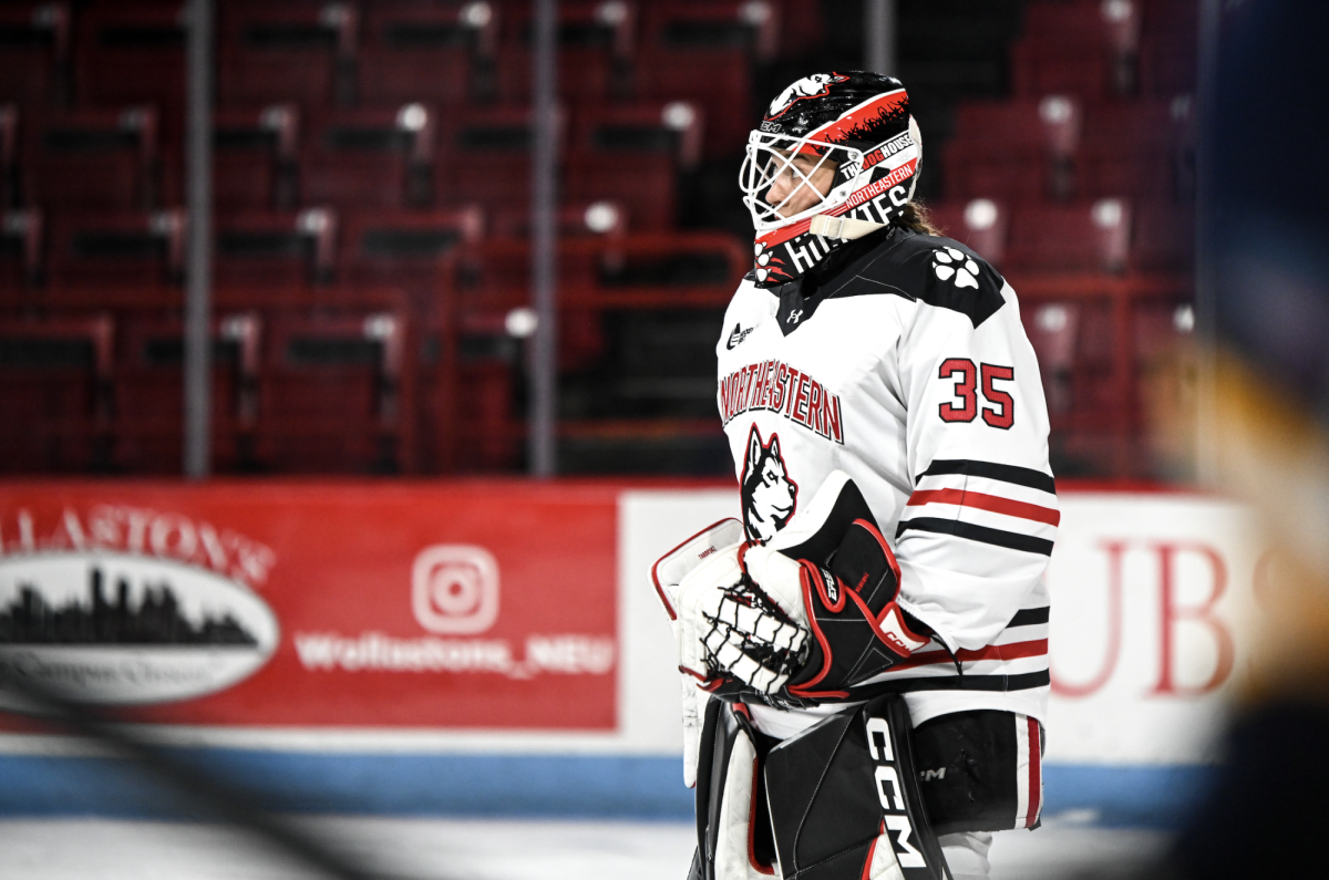 Paige Taborski prepares to protect the net Oct. 5. The Husky tallied 56 saves total in the weekend series against Quinnipiac.