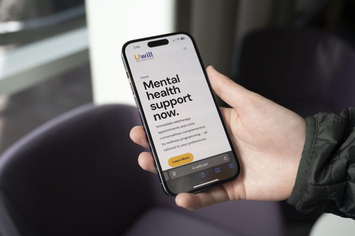 The UWill website home page on a phone. Northeastern switched mental health provider networks from Anthem to Uwill in early May.