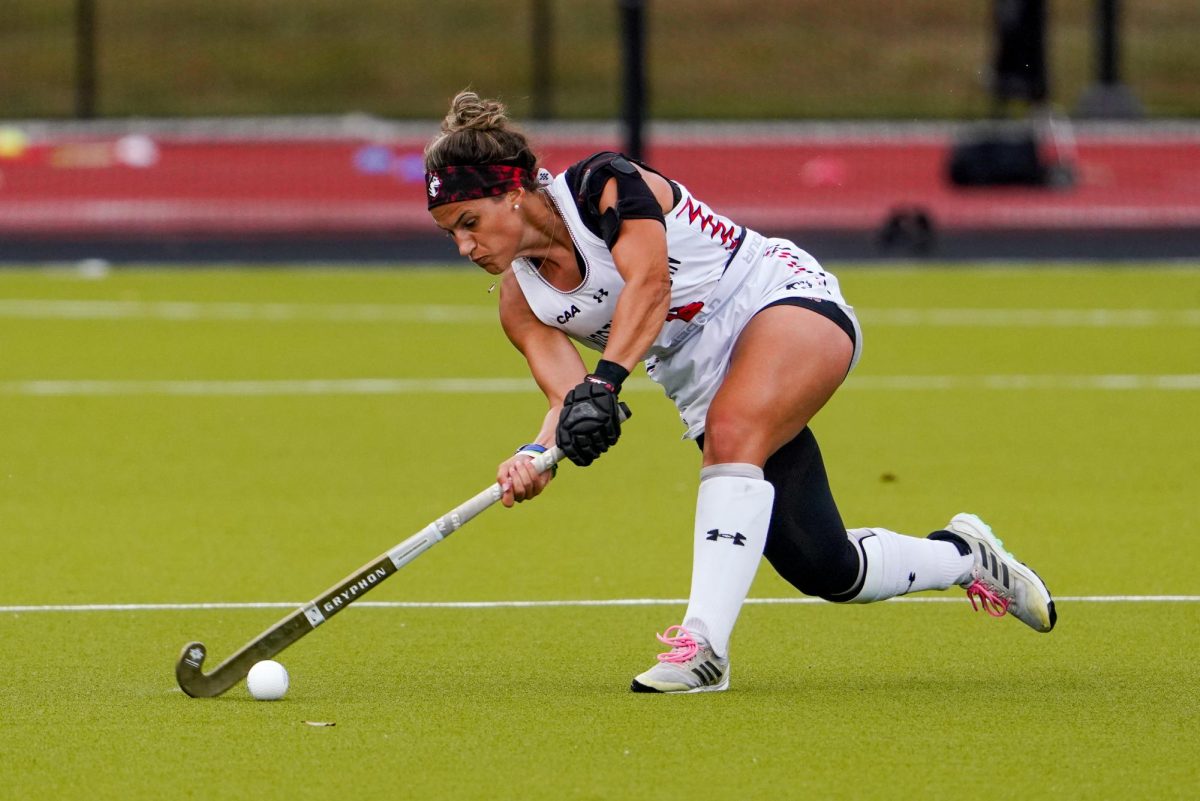 Senior midfielder Maria Armaganian strikes the ball against VCU Sept. 22. Northeastern notched 14 shots compared to UMass Lowell's 11 Sept. 29.