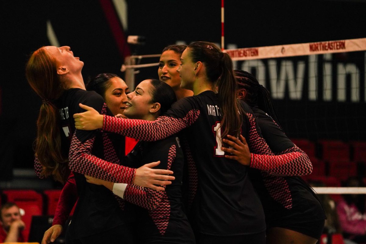 Gomez celebrates with her team in a 3-1 win over UNCW Sept. 22. She tallied a game-high 12 kills and five aces in the match.