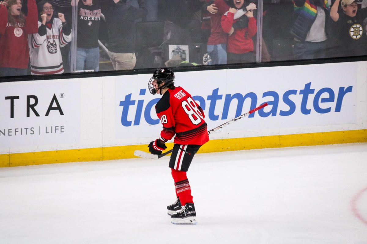 Irving hypes up the DogHouse at the Beanpot finals against Boston University Jan. 23. The Husky scored both of Northeastern’s goals in the 2-1 victory, the second tally coming in the opening 30 seconds of overtime.