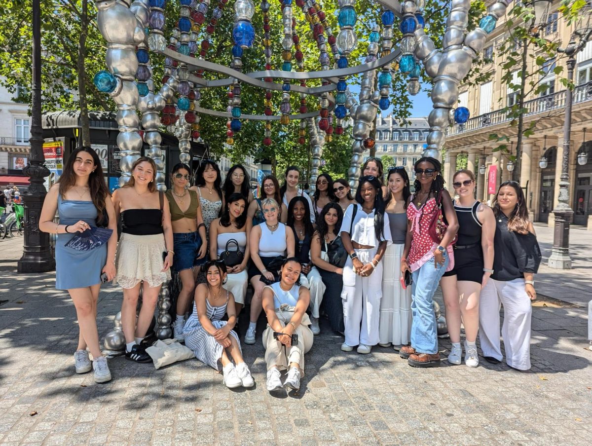 Students who attended this year's Summer 2 Paris Dialogue of Civilizations pose for a group photo. The project-based program taught students about fashion marketing. Photo courtesy Ola Gradzka.