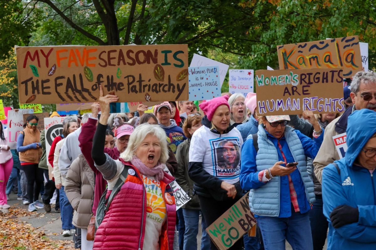 Protesters at the Boston Women’s March hold signs advocating for reproductive rights and Kamala Harris’ presidential campaign Nov. 2. Read more here.