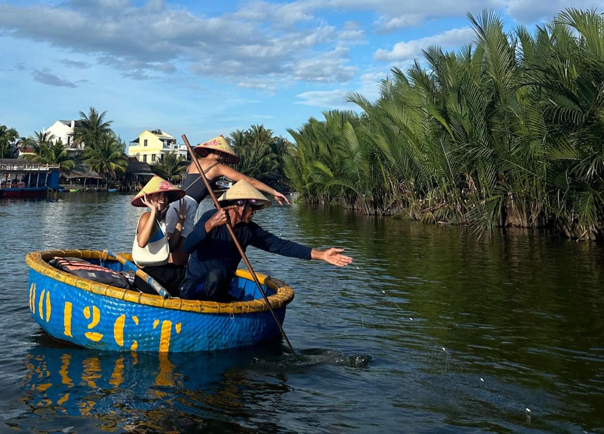 Students float down the Hoi An Cha River in coconut boats. They learned about fishing and casting from locals alongside marketing entrepreneurship. Photo Courtesy Leila Rooney.