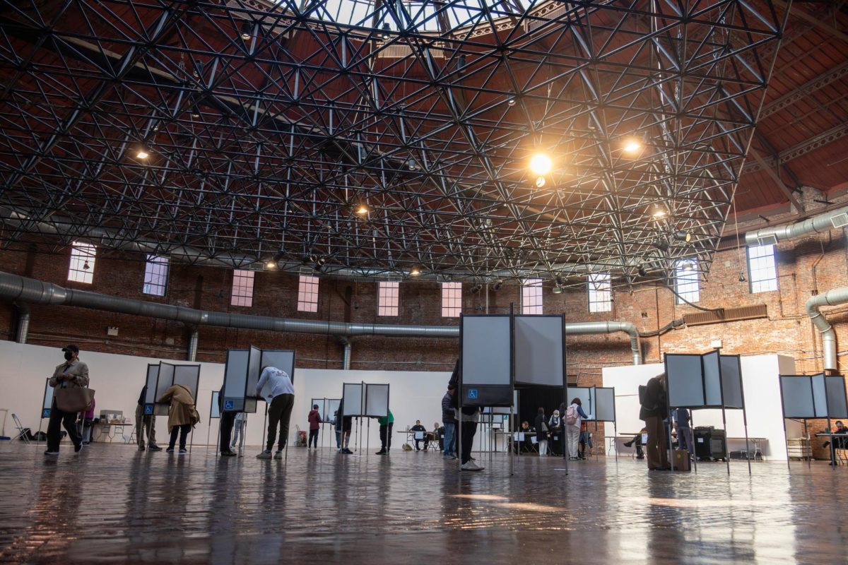 Citizens from four different precincts vote in the BCA Cyclorama. Despite the tense atmosphere, the weather was sunny with warm temperatures.